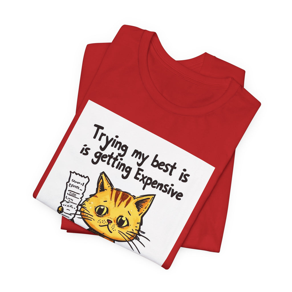 Cat Humor T‑Shirt – "Trying My Best Is Getting Expensive" Cute Orange Kitty Graphic Tee